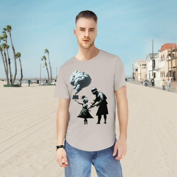 A man and woman wearing a spray paint t-shirt with war street art, reminiscent of Banksy, stand on the beach. A man and woman wearing a spray paint t-shirt with war street art, reminiscent of Banksy, stand on the beach.