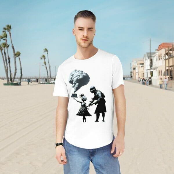 A man and woman wearing a Banksy-inspired spray paint t-shirt displaying war street art while standing on the beach. A man and woman wearing a Banksy-inspired spray paint t-shirt displaying war street art while standing on the beach.
