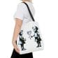 A woman is holding a Street Art Durable Tote Bag.