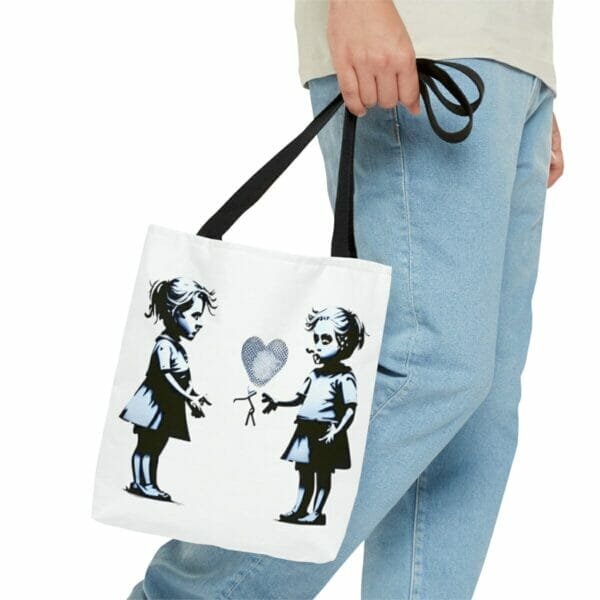 A Street Art Durable Tote Bag featuring two girls holding balloons. A Street Art Durable Tote Bag featuring two girls holding balloons.