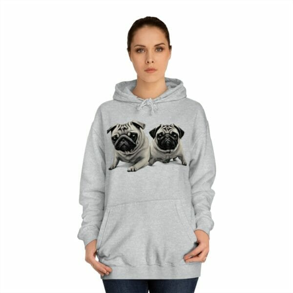 A woman wearing a Twin Pug Unisex College Hoodie. A woman wearing a Twin Pug Unisex College Hoodie.