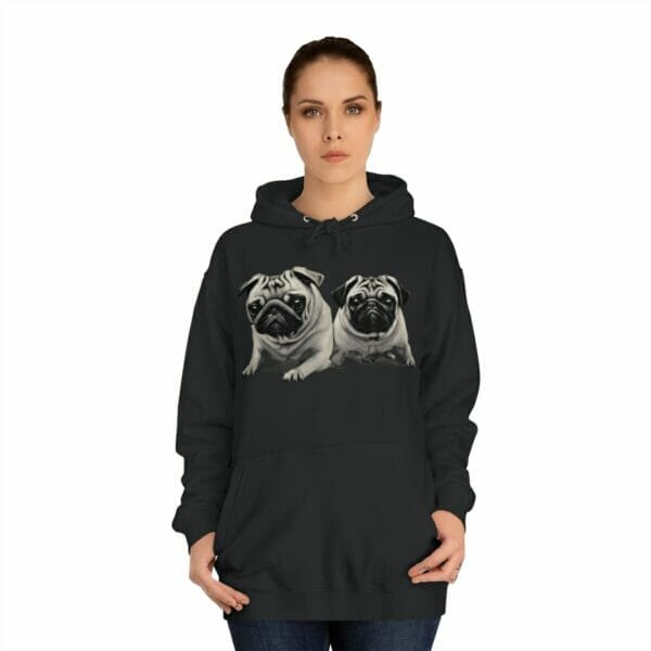 A woman wearing a Twin Pug Unisex College Hoodie. A woman wearing a Twin Pug Unisex College Hoodie.