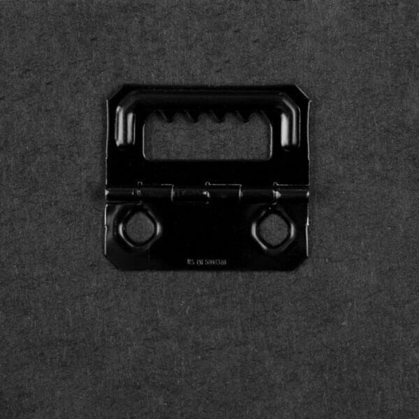 A black handle on an Action Painting Canvas surface. A black handle on an Action Painting Canvas surface.