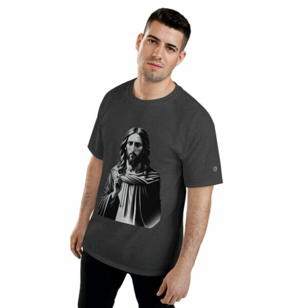A man wearing a black t - shirt with an image of jesus. A man wearing a black t - shirt with an image of jesus.