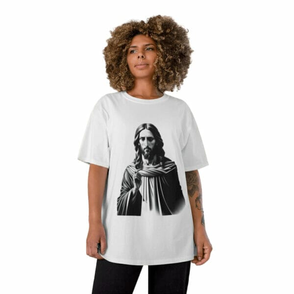 A woman wearing a white t - shirt with a black and white image of jesus. A woman wearing a white t - shirt with a black and white image of jesus.