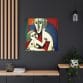 A modern-style interior showcases the "Mother's Love Cubism Art Canvas," a vibrant cubistic art piece set against a dark wall, complemented by a plant and decorative items on a wooden shelf.