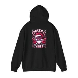 Christmas Vibes Loving Santa Unisex Heavy Blend™ Hooded Sweatshirt, a black hoodie showcasing a graphic of a pink Santa wearing sunglasses, flashing peace signs, accompanied by the text "Christmas Vibes.