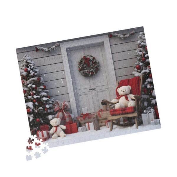 The Christmas Doorway Puzzle, available in 110, 252, or 520 pieces, showcases a snowy porch scene with two teddy bears, gift boxes, a wreath on the door, and two decorated trees. Some puzzle pieces are scattered in front.