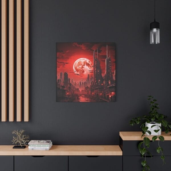 A modern room with dark walls showcases the Blood Moon Over Ruins — Dystopian Cityscape Canvas (stretched, 1.25"), alongside a hanging light, a small plant, and books on a light wood shelf. A modern room with dark walls showcases the Blood Moon Over Ruins — Dystopian Cityscape Canvas (stretched, 1.25"), alongside a hanging light, a small plant, and books on a light wood shelf.