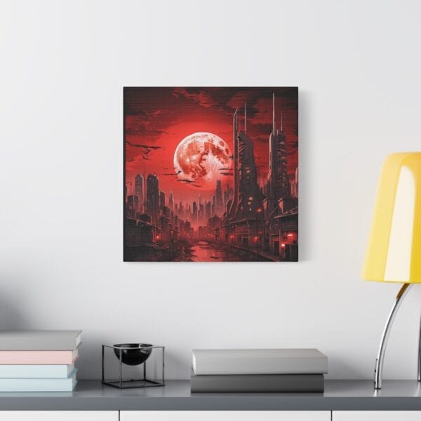 Blood Moon Over Ruins — Dystopian Cityscape Canvas, Stretched 1.25", is a wall-mounted artwork showing a futuristic city beneath a red moon, displayed above a modern shelf with books, bowl, and yellow lamp. Blood Moon Over Ruins — Dystopian Cityscape Canvas, Stretched 1.25", is a wall-mounted artwork showing a futuristic city beneath a red moon, displayed above a modern shelf with books, bowl, and yellow lamp.